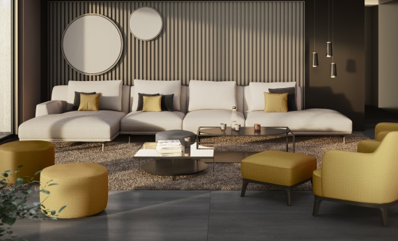 Sofa chaislonge blanco de cuatro plazas y cojines en amarillo