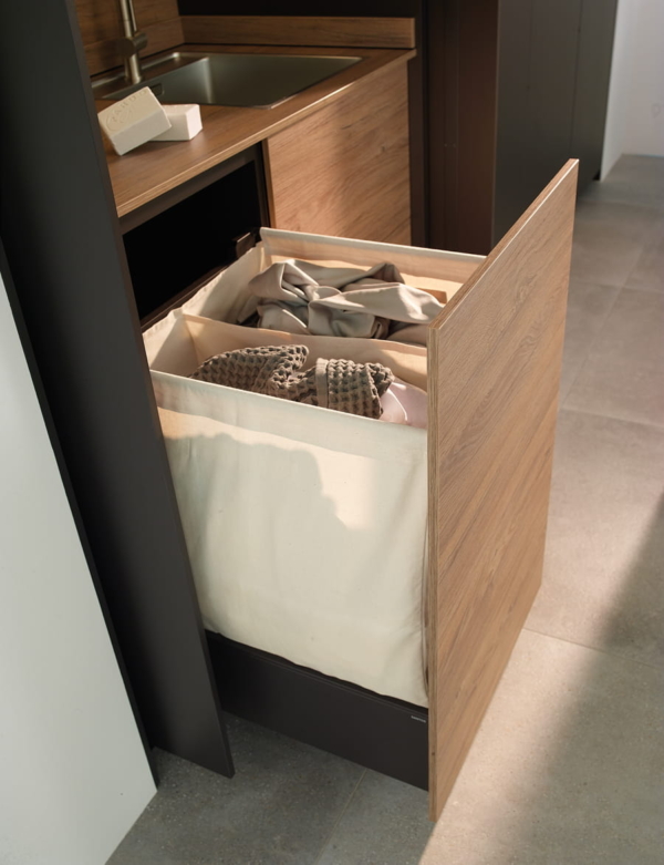 gaveta-con-saco-para-ropa-santos Cajones organizadores de Cocinas Santos en Gandía, ideales para mantener utensilios, cubiertos y accesorios en orden de manera eficiente.