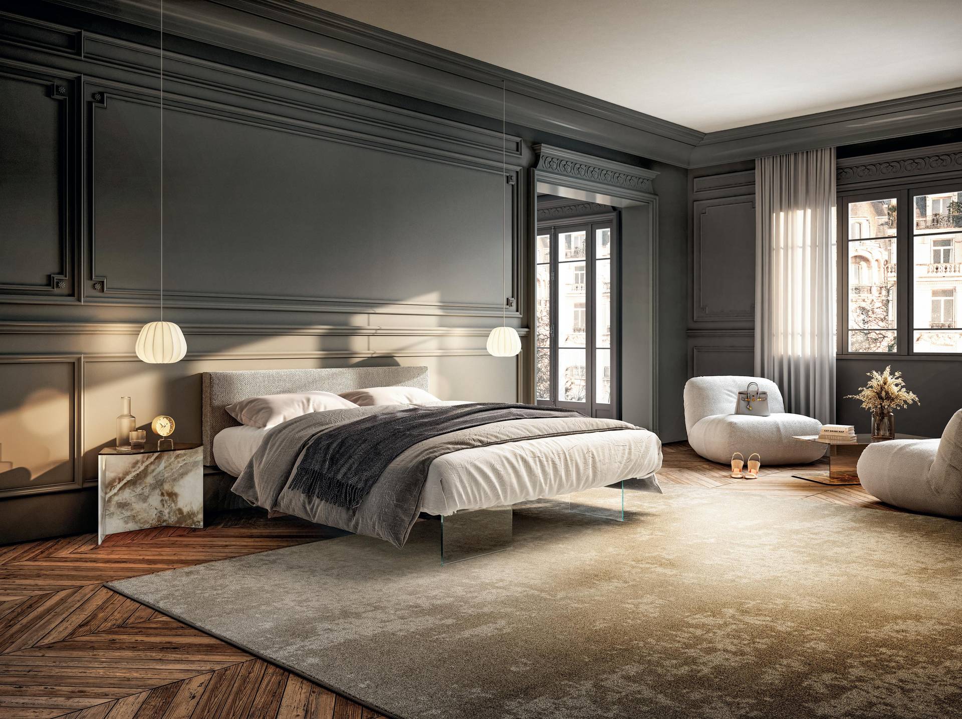Dormitorio espectacular con cama con patas de cristal al aire y cabezal tapizado con dos sillones redondos en blanco en frente